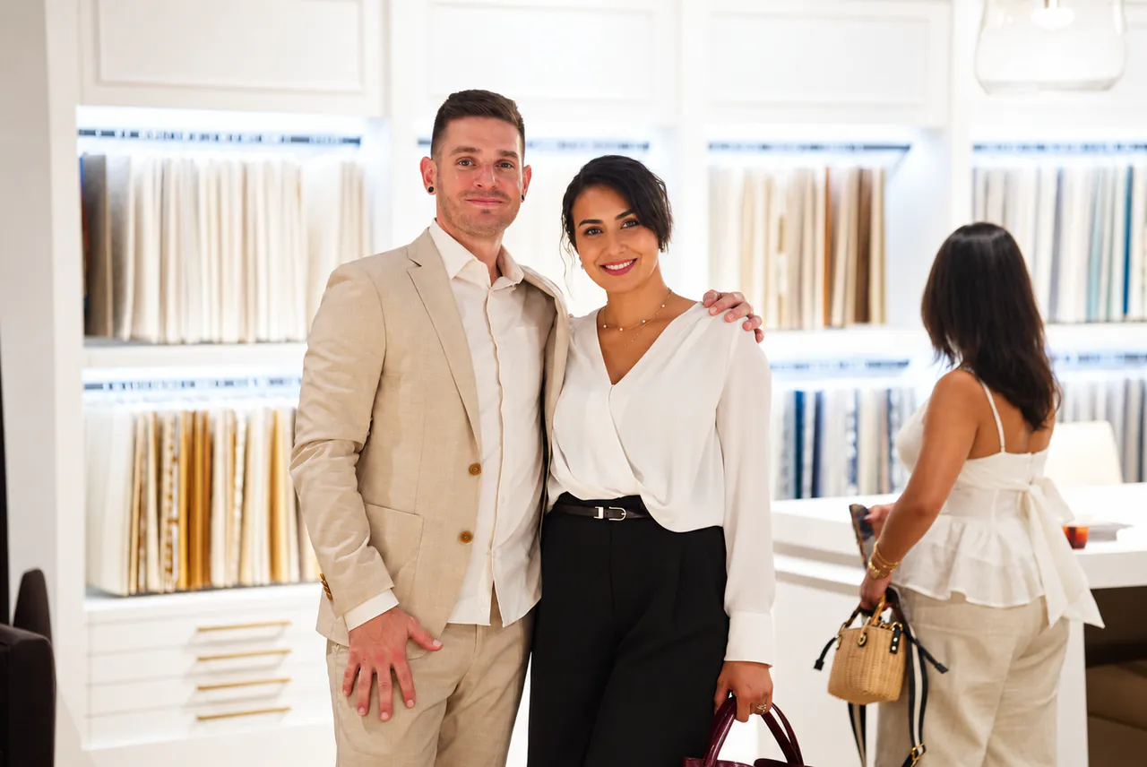 Two guests by the fabric samples at Capitol Keys